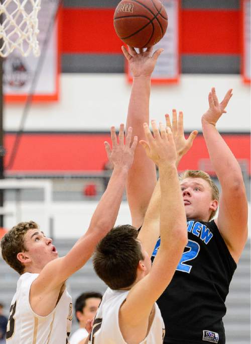 Trent Nelson  |  The Salt Lake Tribune
Sky View's Tyler Downs takes a shot as Sky View faces Davis High School in the championship game of the Utah Elite 8 basketball tournament in American Fork, Saturday December 13, 2014.