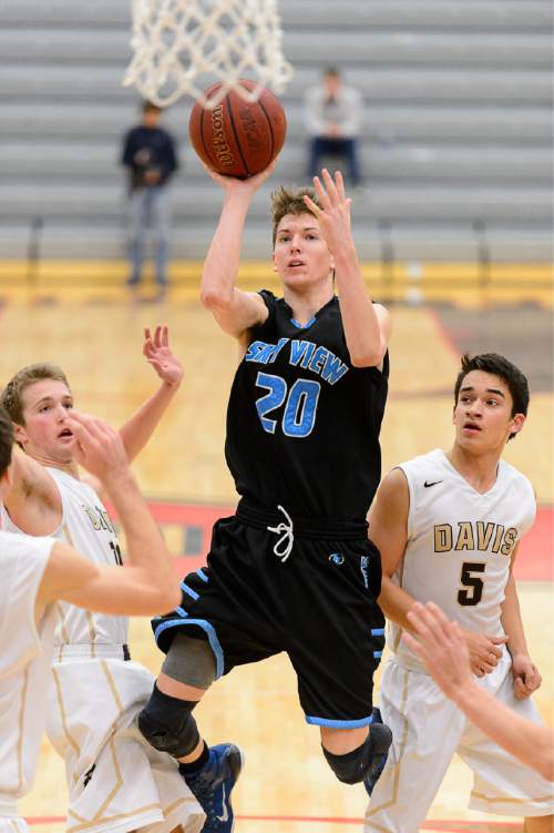 Trent Nelson  |  The Salt Lake Tribune
Sky View's Jake Hendricks takes a shot as Sky View faces Davis High School in the championship game of the Utah Elite 8 basketball tournament in American Fork, Saturday December 13, 2014.