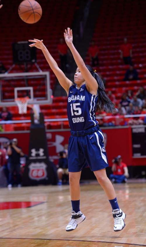 Leah Hogsten  |  The Salt Lake Tribune
Brigham Young Cougars guard Kylie Maeda (15) fires off a three pointer. The University of Utah lost to  Brigham Young University 60-56, Saturday, December 13, 2014 at the Jon M. Huntsman Center.