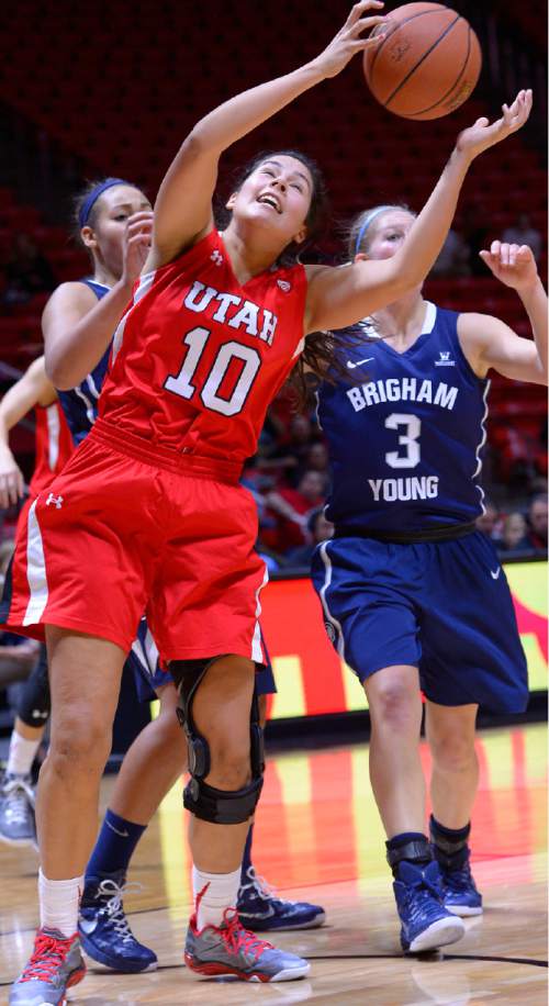 Leah Hogsten  |  The Salt Lake Tribune
Utah Utes forward Nakia Arquette (10) grabs the rebounddfor two. The University of Utah trail Brigham Young University 32-29, Saturday, December 13, 2014 at the Jon M. Huntsman Center.