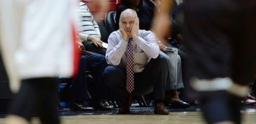 Steve Griffin  |  The Salt Lake Tribune

University of Utah women's basketball head coach Anthony Levrets holds his head in is hands in disbelief after a call went against the Utes during the Utah versus Idaho State women's basketball game at the Huntsman Center on the University of Utah campus in Salt Lake City, Wednesday, December 10, 2014.