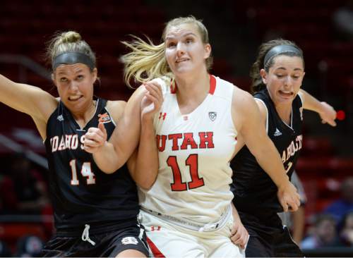Steve Griffin  |  The Salt Lake Tribune

Idaho State Bengals guard Sherise Porchia (11) and Idaho State Bengals guard Grace Kenyon (2) grit their teeth as they try and keep Utah Utes forward Taryn Wicijowski (11) off the boards during the Utah versus Idaho State women's basketball game at the Huntsman Center on the University of Utah campus in Salt Lake City, Wednesday, December 10, 2014.