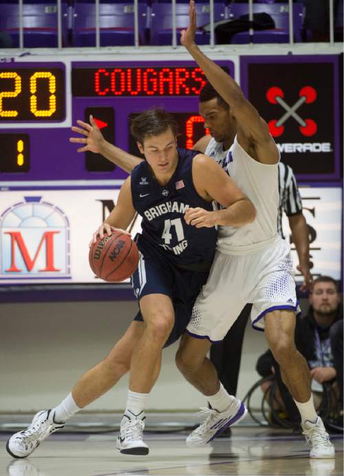 Rick Egan  |  The Salt Lake Tribune

Brigham Young Cougars forward Luke Worthington (41) works the ball inside, in basketball action BYU vs Weber State, at the Dee Events Center in Ogden, Saturday, December 13, 2014