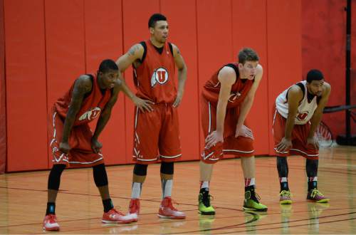 Francisco Kjolseth  |  The Salt Lake Tribune
Utah players Delon Wright, Jordan Loveridge, Jakob Poeltl and Isaiah Wright, from left, wait their turn during a recent practice. Utah's new motion offense should free up playmakers to take more initiative on the court.