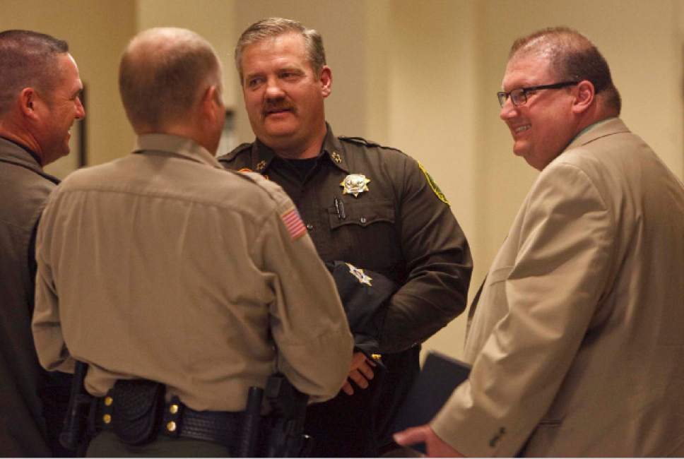 Leah Hogsten  |  The Salt Lake Tribune
 Beaver County Sheriff Cameron Noel (right) Davis County Sheriff Todd Richarson (center) and Iron County Sheriff Mark Gower (left) joined other members of the the House Law Enforcement and Criminal Justice Committee of the Legislature at the State Capitol Complex House Building, Tuesday January 29, 2013. The Utah Sheriff's Association sent a letter to President Barack Obama saying Utah law enforcement officials would lay down their lives to protect the Constitution.