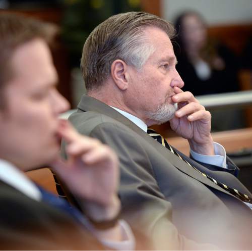 Al Hartmann  |  The Salt Lake Tribune 
Prosecuter Robert Stott listens to witness testimony in David Fresques preliminary trial in West Jordan Thursday February 6.  Fresques is charged with aggravated murder for allegedly killing three people at a Midvale home in February 2013.