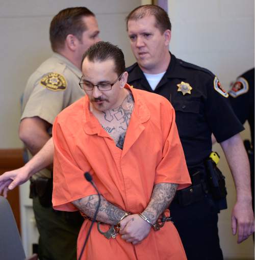 Al Hartmann  |  The Salt Lake Tribune 
David Fresques, charged with aggravated murder for allegedly killing three people at a Midvale home in February 2013 appears in Judge Mark Kouris'  court in West Jordan for his preliminary trial Thursday February 6.