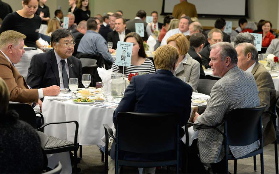 Francisco Kjolseth  |  The Salt Lake Tribune
Salt Lake County Councilman Randy Horiuchi, second from left, is joined by friends and developers Kem Gardner, left, and Terry Diehl, second from right, during an event to honor Horiuchi who is retiring.
