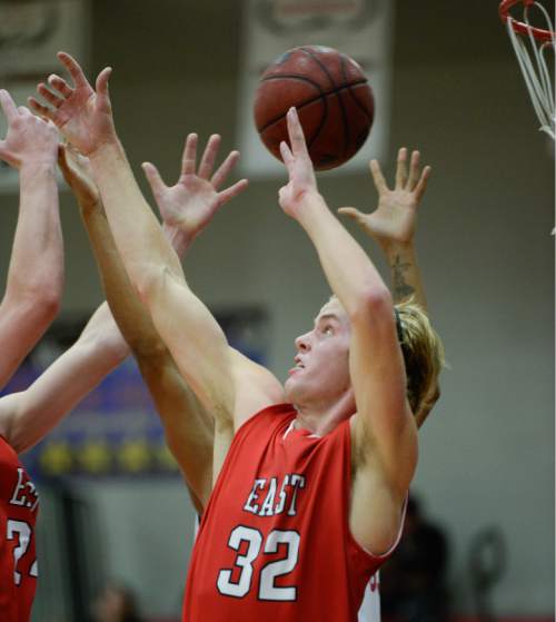 Francisco Kjolseth  |  The Salt Lake Tribune
East High's Blake Hansen battles West in the Panthers Classic tournament between the two rival schools at West.
