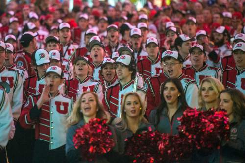 Chris Detrick  |  The Salt Lake Tribune
Members of the Marching Utes band and Utah fans cheer on the football team during the Fremont Street Experience Pep Rally in Las Vegas Friday December 19, 2014.