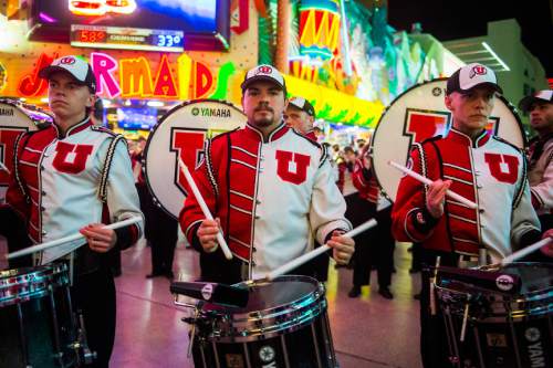 Chris Detrick  |  The Salt Lake Tribune
Members of the Marching Utes band perform during the Fremont Street Experience Pep Rally in Las Vegas Friday December 19, 2014.