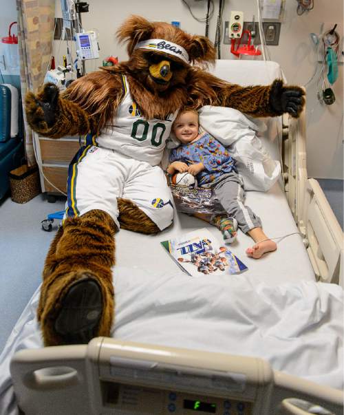 Trent Nelson  |  The Salt Lake Tribune
Bear, the mascot of the Utah Jazz, poses for a photo with 4-year-old Beckham Hendrix during a visit by Jazz players to Primary Children's Medical Center in Salt Lake City on Thursday.