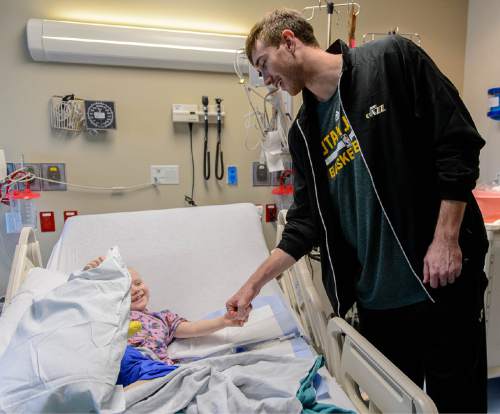 Trent Nelson  |  The Salt Lake Tribune
Utah Jazz player Gordon Hayward gives a fist bump to Brady Hatch, 4, during a visit by Jazz players to Primary Children's Medical Center in Salt Lake City, Thursday December 11, 2014.
