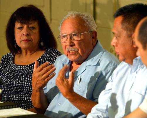 Rick Egan  |  Tribune file photo

Left to right - Brandy Farmer listens as Archie Archuleta, talks about President Obama's statement on immigration, at a press conference earlier this year. Tony Yapias and Mark Alvarez are on are the right.