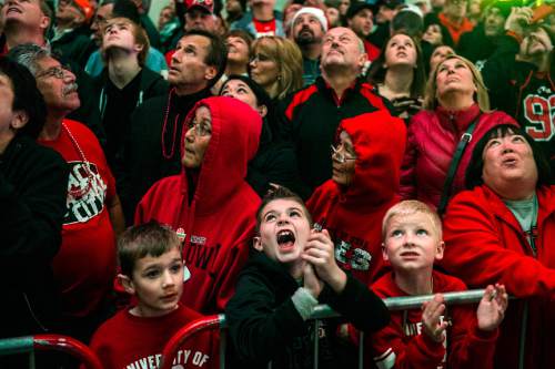 Chris Detrick  |  The Salt Lake Tribune
Utah fans cheer as they watch highlights of the football team on the overhead screen during the Fremont Street Experience Pep Rally in Las Vegas Friday December 19, 2014.