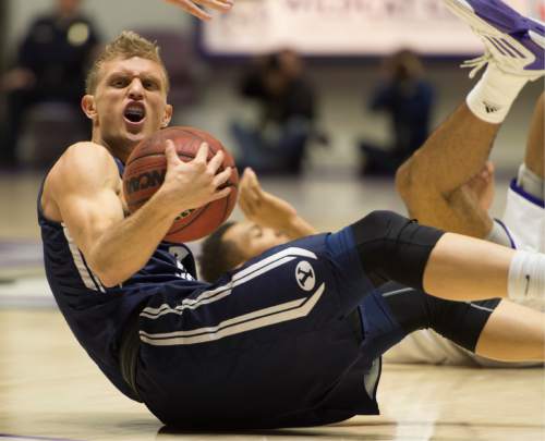Rick Egan  |  The Salt Lake Tribune

Brigham Young Cougars guard Tyler Haws (3) reacts after forcing a jump ball, in basketball action BYU vs Weber State, at the Dee Events Center in Ogden, Saturday, December 13, 2014