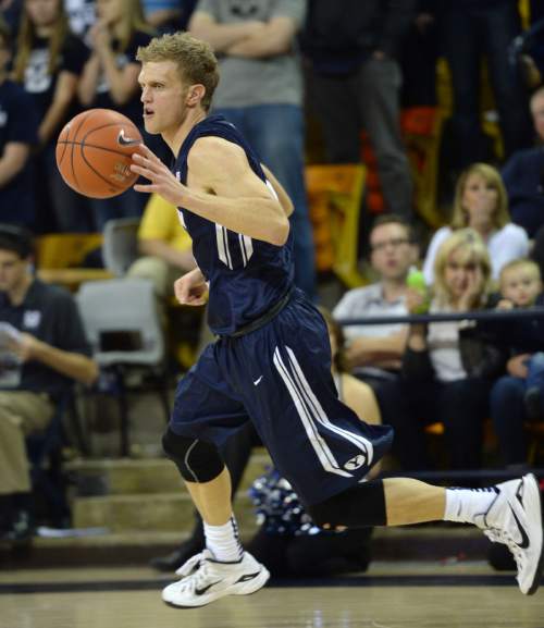 Steve Griffin  |  The Salt Lake Tribune

Brigham Young Cougars guard Tyler Haws (3) heads up court during second half action in the BYU versus USU men's basketball game in Logan, Tuesday, December 2, 2014.