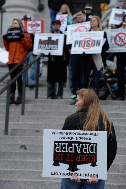 Francisco Kjolseth  |  The Salt Lake Tribune
Crystal Hovey of Tooele city joins the five community groups opposing the prison relocation during a mass protest at noon, on the south steps of the Utah Capitol on Monday, Dec. 22, 2014, two hours before the Prison Relocation Commission meeting.