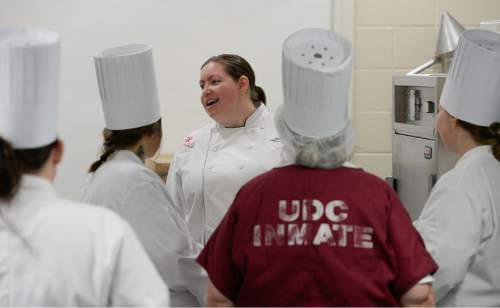 Francisco Kjolseth  |  The Salt Lake Tribune
DATC Culinary Instructor,  Monica Hobbs, gives instructions to her students before their holiday luncheon.