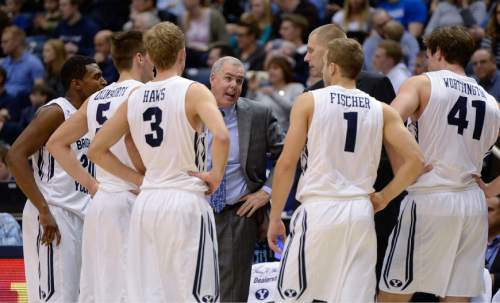 Francisco Kjolseth  |  The Salt Lake Tribune
BYU coach Dave Rose talks to the team in the final minutes of the game against UMass at the Marriott Center in Provo on Tuesday, Dec. 23, 2014.