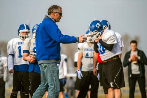 Chris Detrick  |  The Salt Lake Tribune
 Bingham offensive coordinator John Lambourne works with members of the Bingham High School football team as they practice Wednesday December 17, 2014. Bingham will compete in the State Champions Bowl Series December 27th at Florida Atlantic University.