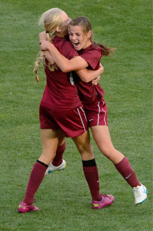 Trent Nelson  |  The Salt Lake Tribune
Cedar City's Nicole Jenkins, right, celebrates her goal with teammate Holly Carpenter. Cedar City defeats Desert Hills in the 3A girls' high school soccer state championship game at Rio Tinto Stadium in Sandy, Saturday October 25, 2014.