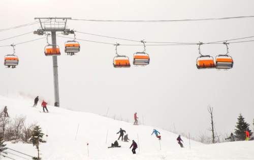 Rick Egan  |  The Salt Lake Tribune

Skiers and snow boarders, make their way down the hill, under the Orange Bubblegum Express at The Canyons Resort, Friday, December 26, 2014