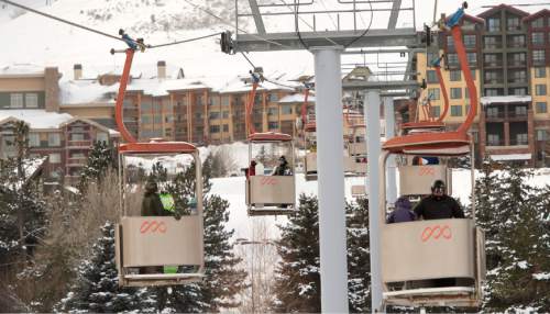 Rick Egan  |  The Salt Lake Tribune

Skiers head back to their cars on the Cabriolet, after a day of skiing at the Canyons Resort, Friday, December 26, 2014