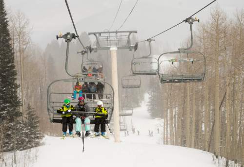Rick Egan  |  The Salt Lake Tribune

A skier s ride the Saddleback Express express lift, at The Canyons Resort, Friday, December 26, 2014