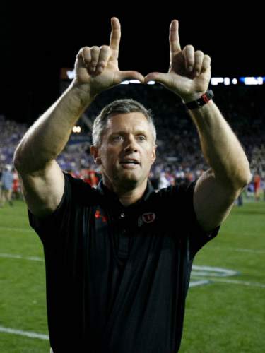 Trent Nelson  |  The Salt Lake Tribune
Utah Utes head coach Kyle Whittingham celebrates the win as the BYU Cougars host the Utah Utes, college football Saturday, September 21, 2013 at LaVell Edwards Stadium in Provo.