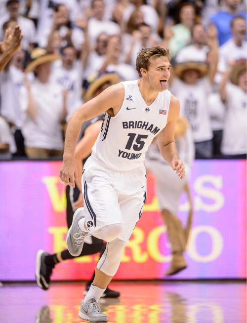 Trent Nelson  |  The Salt Lake Tribune
Brigham Young Cougars guard Jake Toolson (15) wags his tongue after hitting a three-pointer in the first half as BYU hosts Gonzaga, men's college basketball at the Marriott Center in Provo, Saturday December 27, 2014.