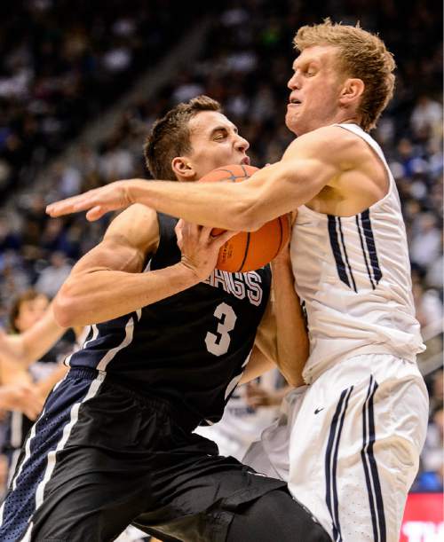 Trent Nelson  |  The Salt Lake Tribune
Gonzaga Bulldogs guard Kyle Dranginis (3) runs into Brigham Young Cougars guard Tyler Haws (3) as BYU hosts Gonzaga, men's college basketball at the Marriott Center in Provo, Saturday December 27, 2014.