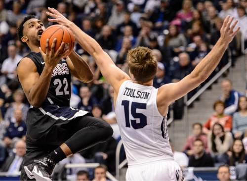 Trent Nelson  |  The Salt Lake Tribune
Gonzaga Bulldogs guard Byron Wesley (22) shoots over Brigham Young Cougars guard Jake Toolson (15) as BYU hosts Gonzaga, men's college basketball at the Marriott Center in Provo, Saturday December 27, 2014.