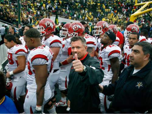 Scott Sommerdorf  |  Salt Lake Tribune
UTAH at OREGON
Even after a tough loss to Oregon, Utah Head Coach Kyle Whittingham was able to give an optimistic thumbs-up to the Utah student section that had come to Eugene to cheer for the Utes. Utah lost to Oregon 31-24, Saturday 9/19/09