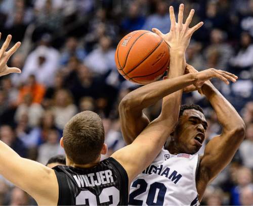 Trent Nelson  |  The Salt Lake Tribune
Gonzaga Bulldogs forward Kyle Wiltjer (33) knocks the ball away from Brigham Young Cougars guard Anson Winder (20) as BYU hosts Gonzaga, men's college basketball at the Marriott Center in Provo, Saturday December 27, 2014.