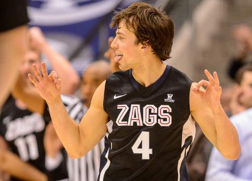 Trent Nelson  |  The Salt Lake Tribune
Gonzaga Bulldogs guard Kevin Pangos (4) celebrates a three-pointer as BYU hosts Gonzaga, men's college basketball at the Marriott Center in Provo, Saturday December 27, 2014.