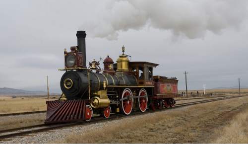 Al Hartmann  |  The Salt Lake Tribune
Union Pacific steam locomotive 199 rolls down the track to the Golden Spike National Historic Site visitor center in northwestern Utah Wednesday Dec. 28, 2011.