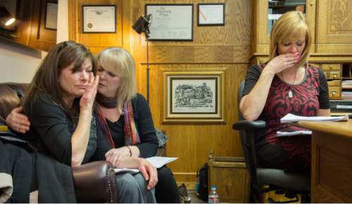 Steve Griffin  |  The Salt Lake Tribune


Susan Hunt, left, is joined by her sisters Barbara Houston, second from left, and Cindy Moss as they become emotional as they listen to attorney Robert Sykes as he details a lawsuit he is filling against Saratoga Springs for the shooting death of Susan Hunt's son Darrian Hunt. Sykes was speaking from his law offices in Salt Lake City, Friday, January 2, 2015.