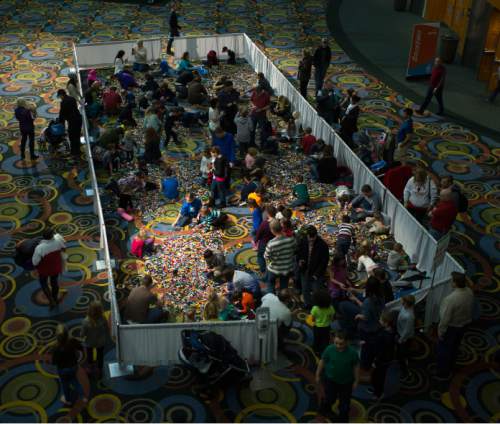 Steve Griffin  |  The Salt Lake Tribune


Adults and youngsters play with Legos as Salt Lake City rings in the new Year at Eve celebration at The Salt Palace Convention Center in Salt Lake City, Wednesday, December 31, 2014.