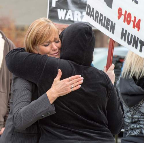 Rick Egan  |  The Salt Lake Tribune

Darrien Hunt's aunt, Cindy Moss, gets a hug from Mystic Young, after making  a speech to supporters, during a rally in  Saratoga Springs , for justice for Darrien Hunt, Friday, November 14, 2014