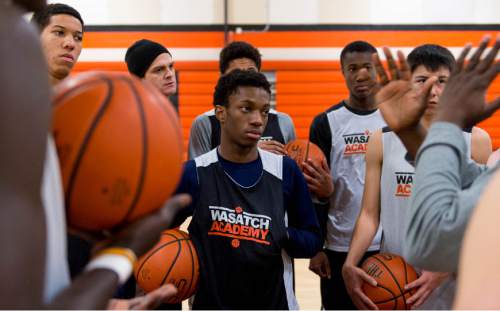 Trent Nelson  |  The Salt Lake Tribune
Wasatch Academy basketball players in a huddle during practice in Mt. Pleasant, Tuesday February 25, 2014. Bryson Langdon at center.
