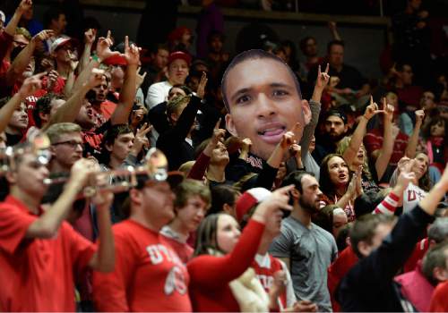 Scott Sommerdorf   |  The Salt Lake Tribune
The Utah fans with a cutout of Utah Utes forward Brekkott Chapman (0) celebrates the rout during a timeout. Utah defeated the USC Trojans 79-55, Friday, January 2, 2015.