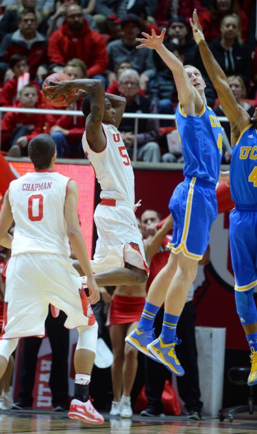 Steve Griffin  |  The Salt Lake Tribune


Utah Utes guard Delon Wright (55) gets the UCLA defense into the air as he passes the ball during second half action in the Utah versus UCLA men's basketball game at the Huntsman Center in Salt Lake City, Sunday, January 4, 2015.