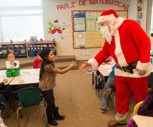 Rick Egan  |  The Salt Lake Tribune

Ken Limb, principal of Mountain View Elementary School, surprises students as he enters the class room to see if they are still on the "nice" list, Friday, December 19, 2014