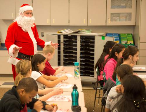 Rick Egan  |  The Salt Lake Tribune

Ken Limb, principal of Mountain View Elementary School, surprises students as he enters the class room to see if they are still on the "nice" list, Friday, December 19, 2014