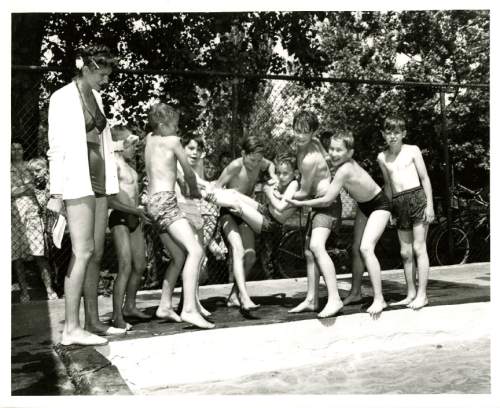 Tribune file photo

Boys play at the Liberty Park pool in this undated photo.