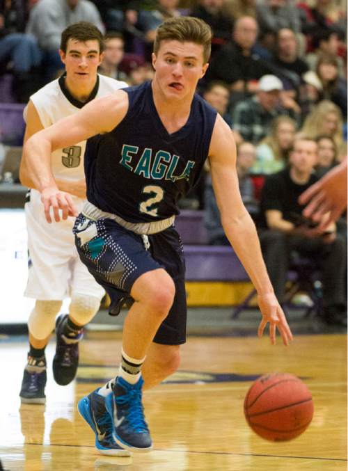 Rick Egan  |  The Salt Lake Tribune

Gabe Colosimo (2) leads a fast break for Juan Diego, in the championship game of the Holiday Prep Tournament at Riverton High, Wednesday, December 31, 2014
