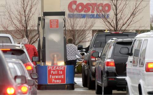 Al Hartmann  |  Tribune file photo
Drivers line up for gas at Costco at 1800 S. 300 West in Salt Lake City as gas prices plummet. But some legislators say the time has come to finally raise the state gas tax -- possibly by as much as 10 cents per gallon.