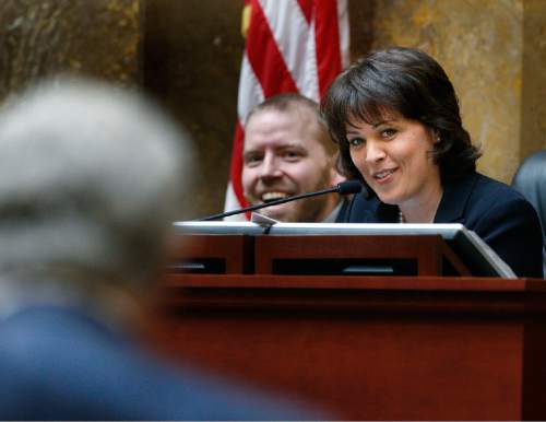 Scott Sommerdorf  |  The Salt Lake Tribune             
Speaker of the House Becky Lockhart, R, Provo, and her Chief of Staff Joe Pyrah, have a laugh as Rep. R. Curt Webb, R, Logan, has HB294 uncircled. Lockhart asked if he'd like to speak to the motion, and in a break from the usual routine, he responded "no" in the Utah House of Representatives, Monday February 13, 2012.