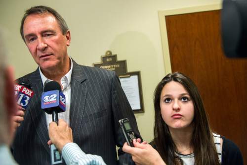 Chris Detrick  |  The Salt Lake Tribune
Former Attorney General Mark Shurtleff and his daughter Annie talk to members of the media after a committee hearing at the State Capitol Wednesday June 18, 2014.